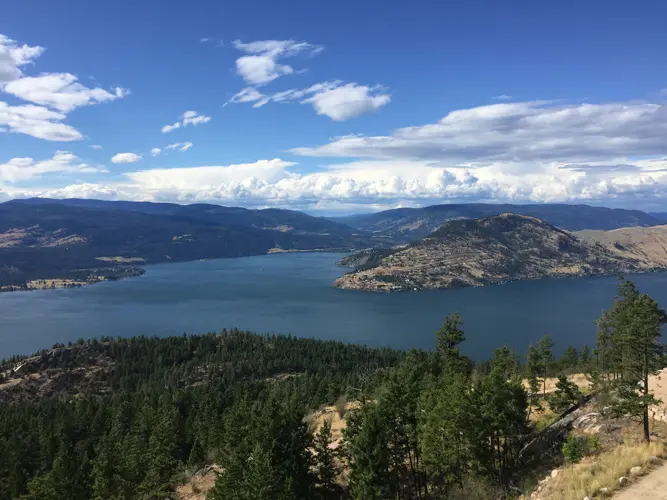 A scenic view of a lake and mountains